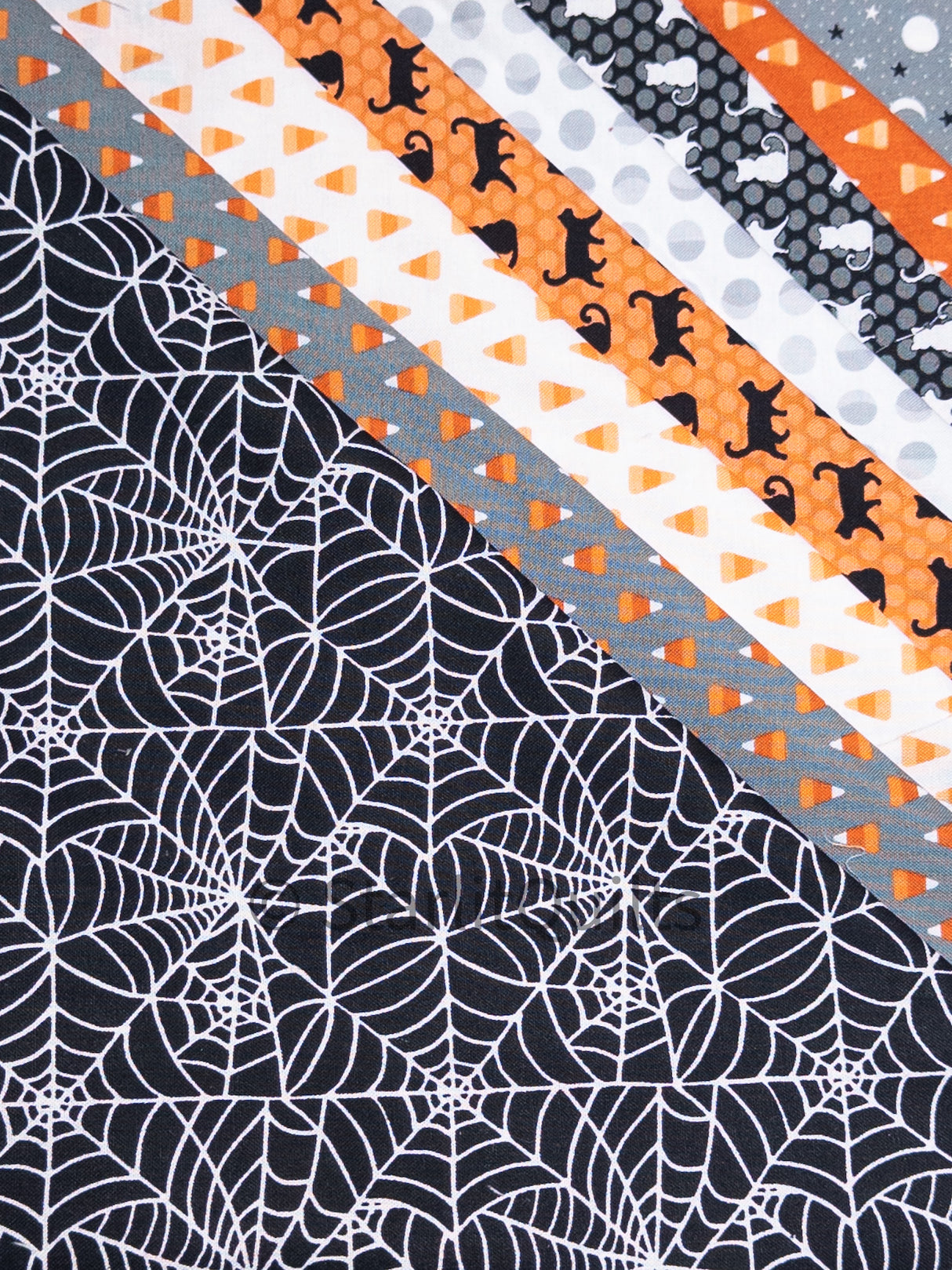 Halloween Theme Orange and Black Colored Fat Quarter Bundle includes 8 Fat Quarters