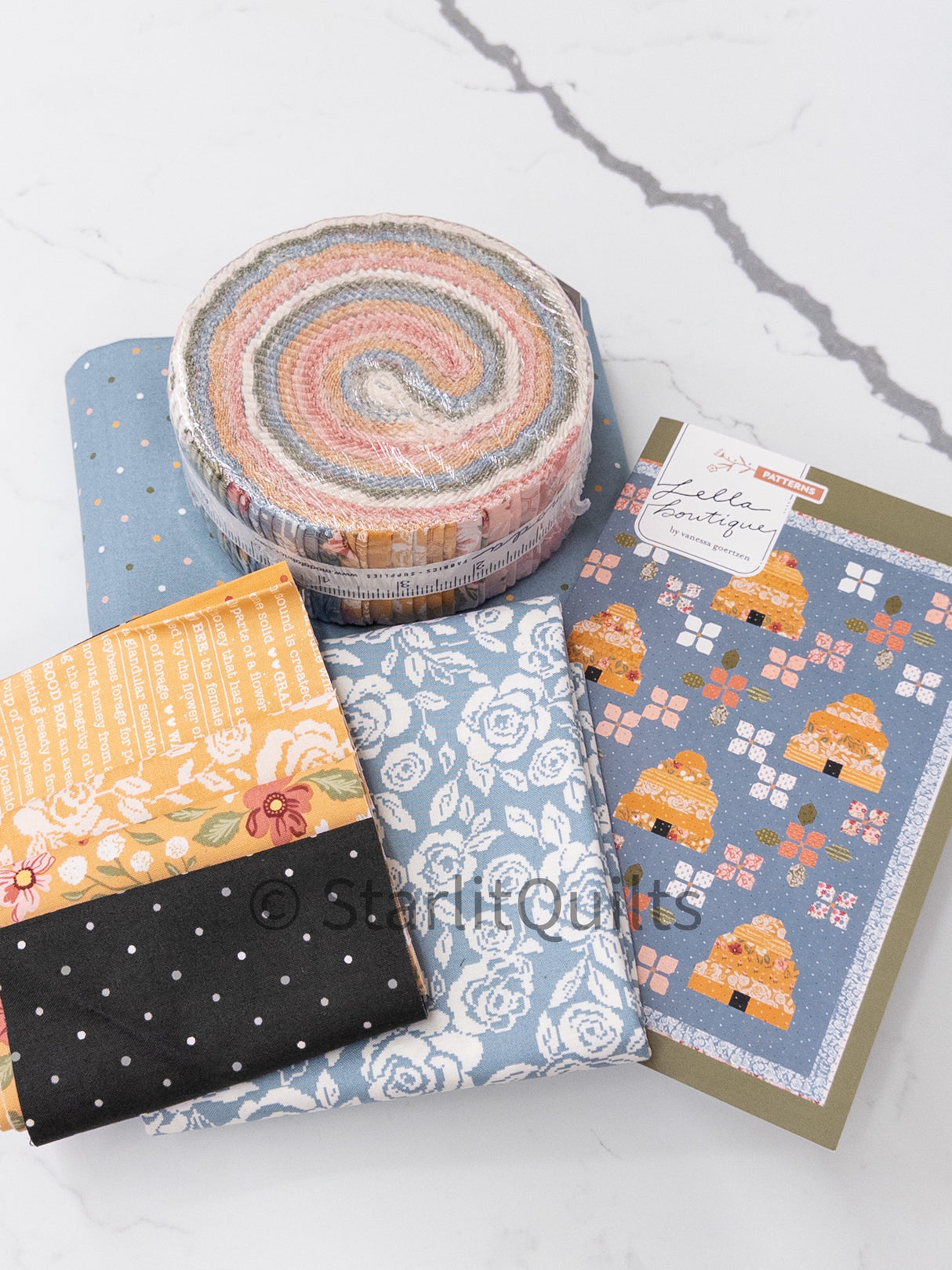 Bloom and Buz Quilt Kit featuring Wild Honey Fabrics using a Jelly Roll By Lella Boutique