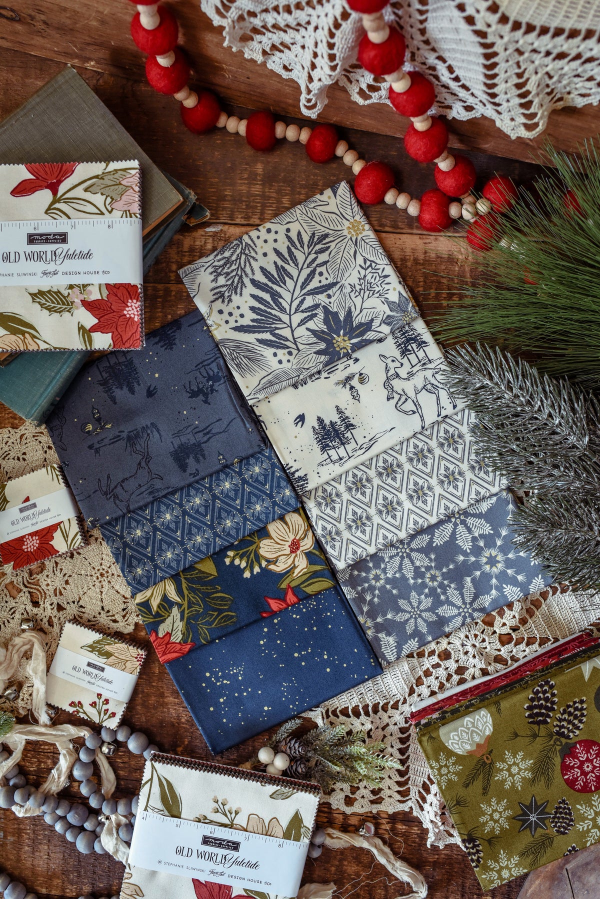 Yuletide Treats Quilt Kit features Old World Yuletide by Fancy That Design House Fabrics for the quilt top, backing and Pattern 52 x 61