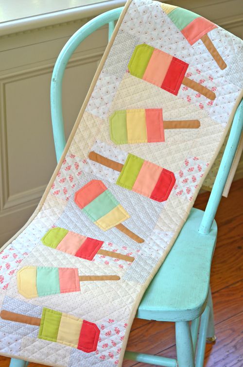 Mini Popsicles Table Runner Quilt Kit includes fabric for the top and the binding.
