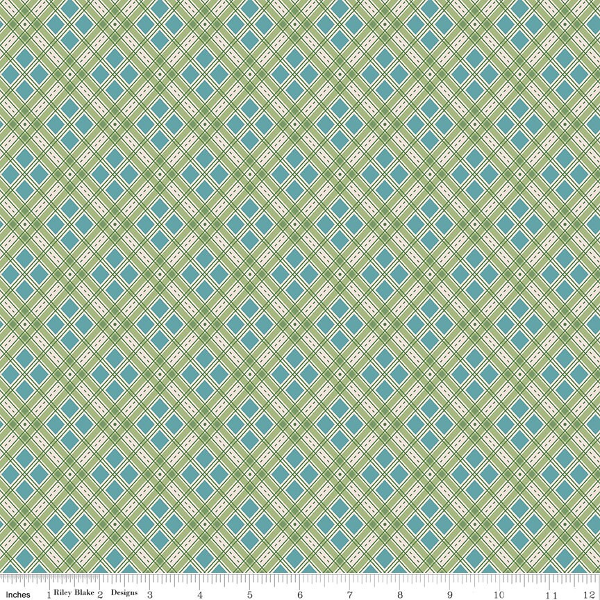 a green and blue checkered pattern with a ruler