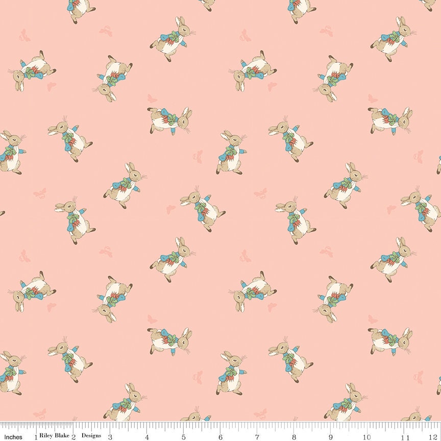 The Tale of Peter Rabbit Coral Peter Toss C14702-Coral Fabrics Sold in 1/2 Yard Increments