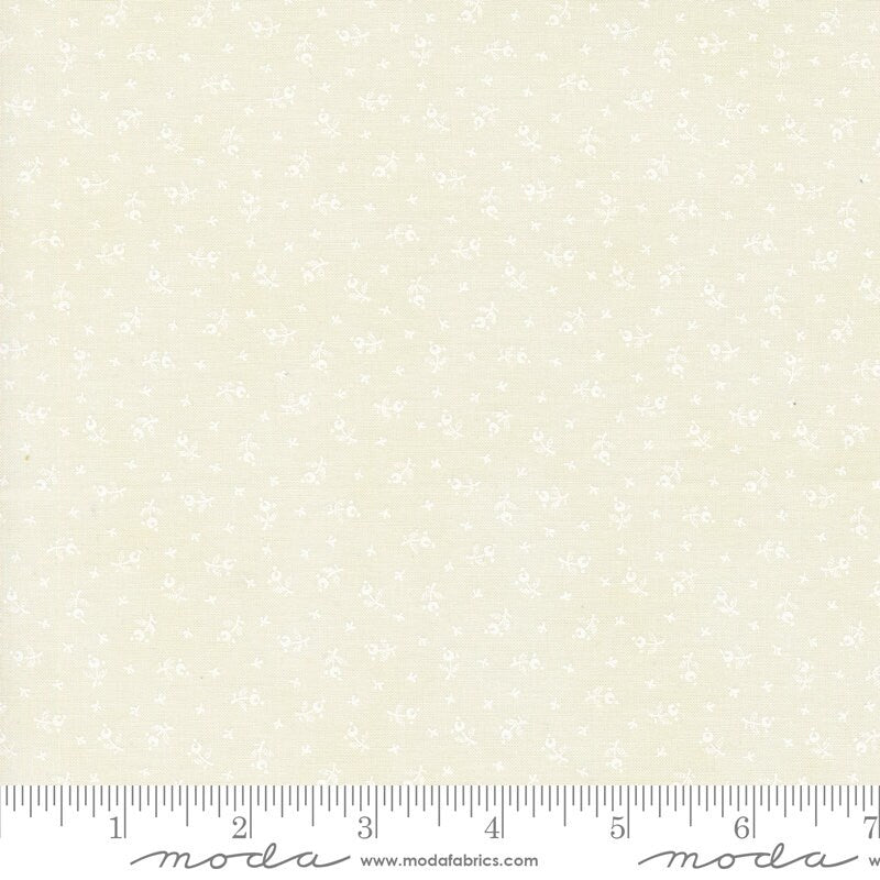 a ruler with a white flower pattern on it