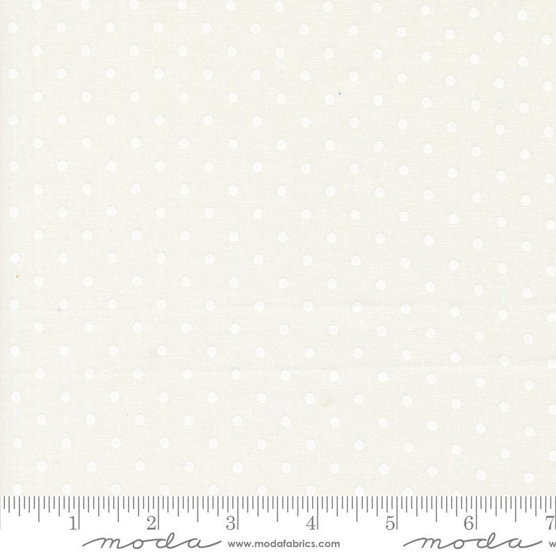 a ruler with white polka dots on it