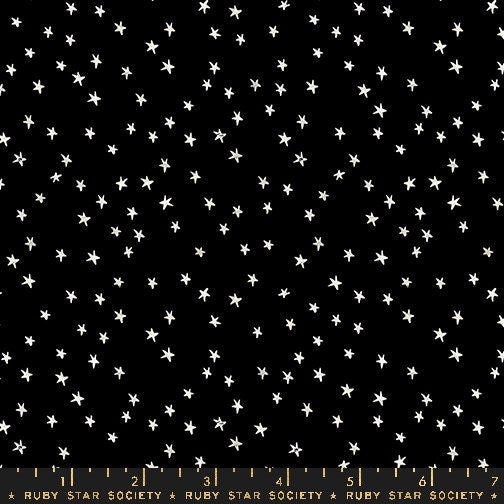 a black background with white stars on it