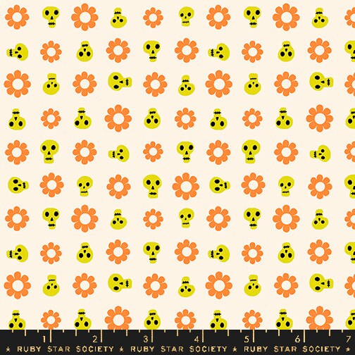 a pattern of skulls and flowers on a white background