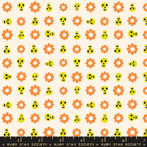 a pattern of skulls and flowers on a white background