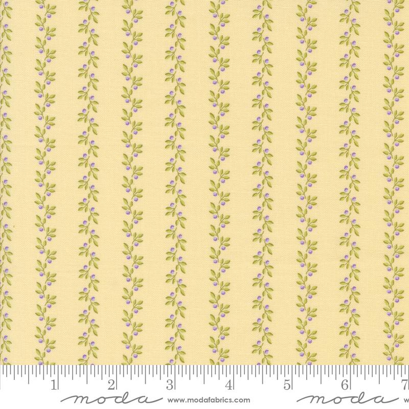 a ruler with a yellow background and a flower pattern