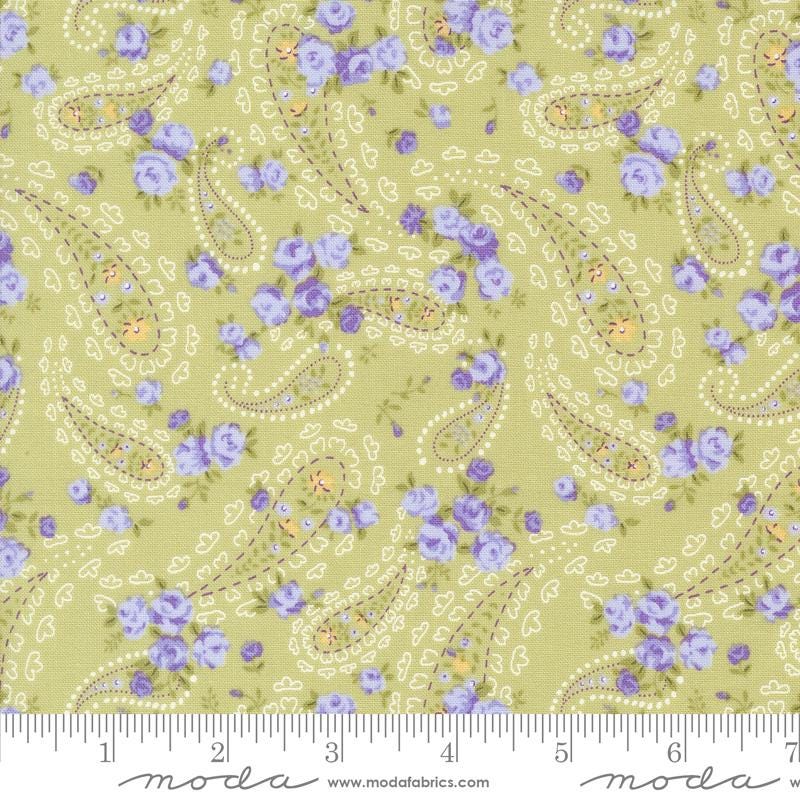 a green background with purple and blue flowers