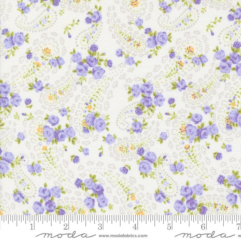 a white background with purple flowers and green leaves