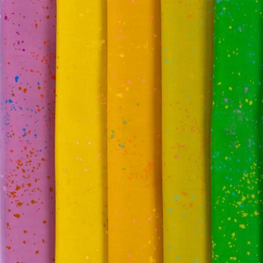 a close up of a row of different colored papers