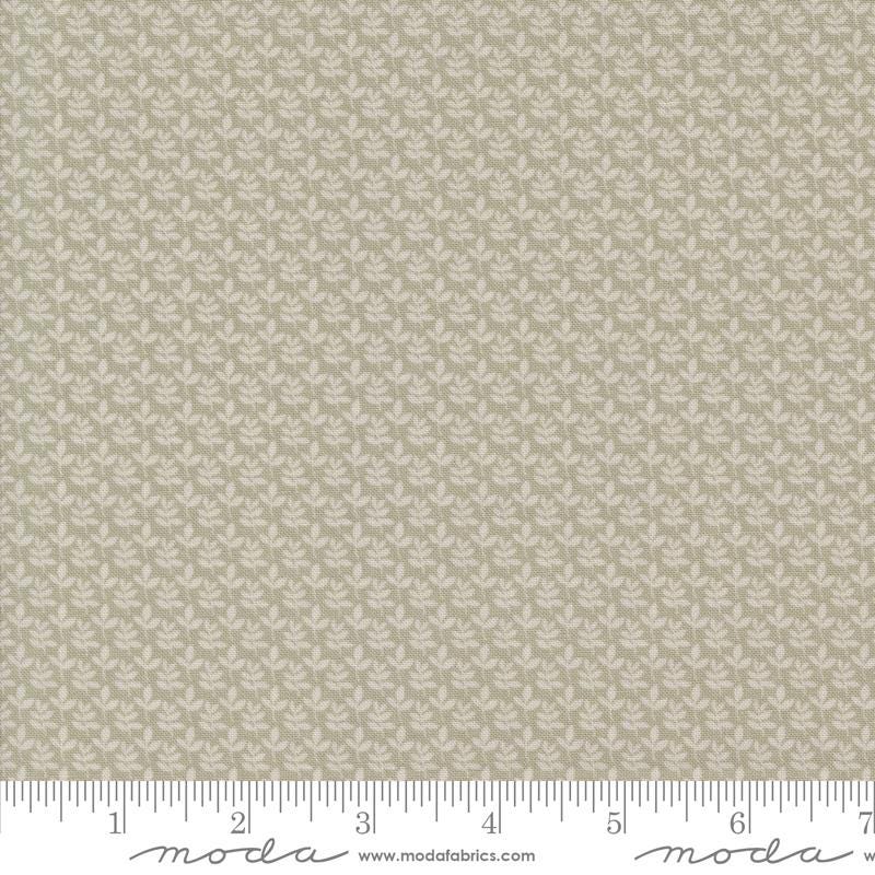 a ruler with a white and beige pattern on it
