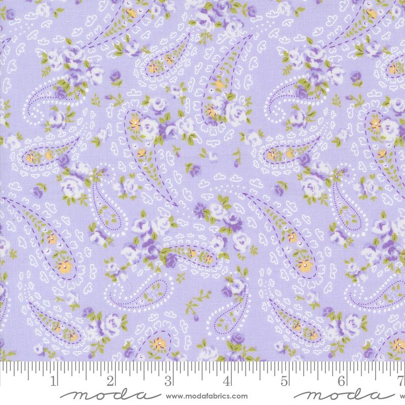 a purple and yellow paisley print fabric
