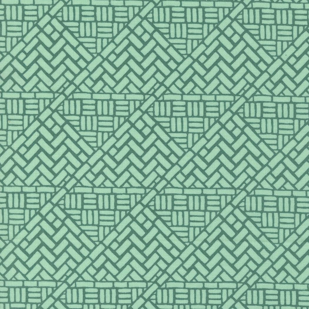 a green background with a pattern of intersecting lines