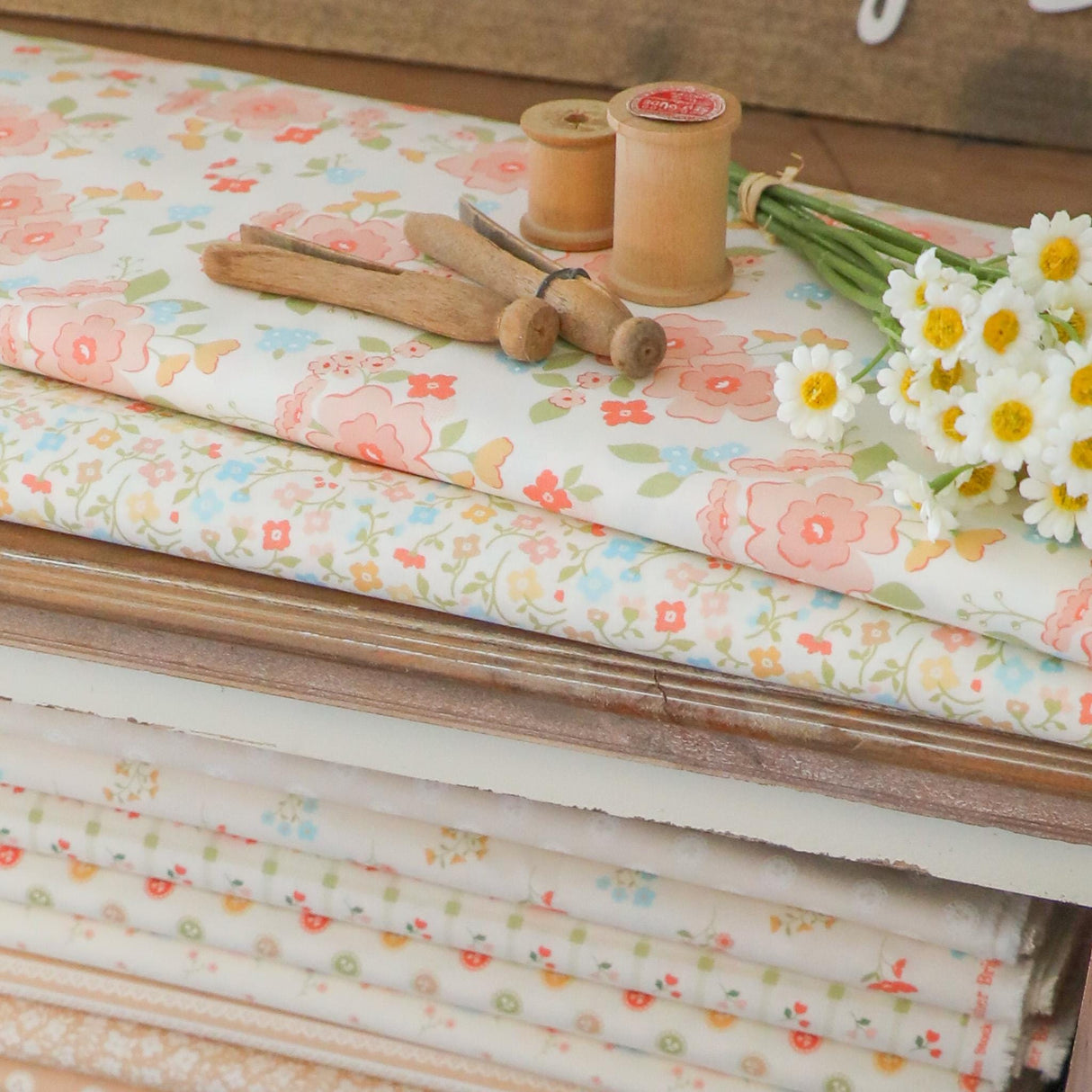 a bunch of flowers sitting on top of a table