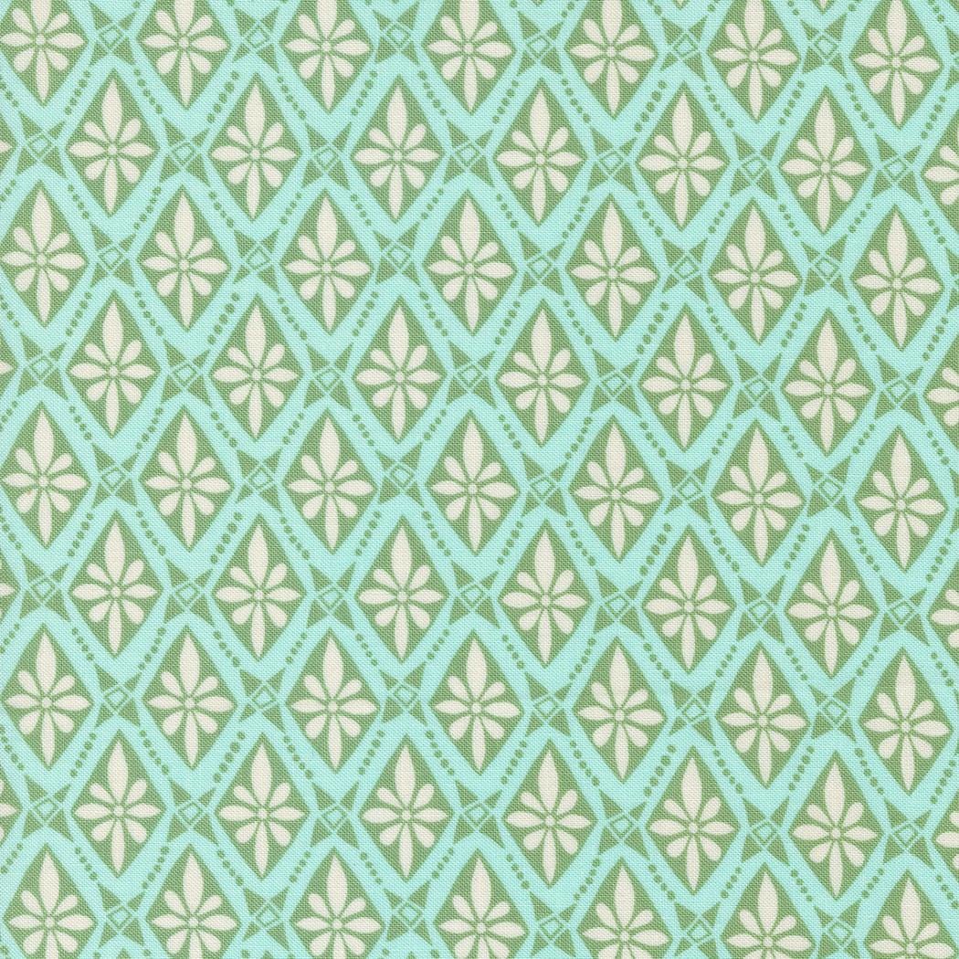 a green and white pattern with small squares