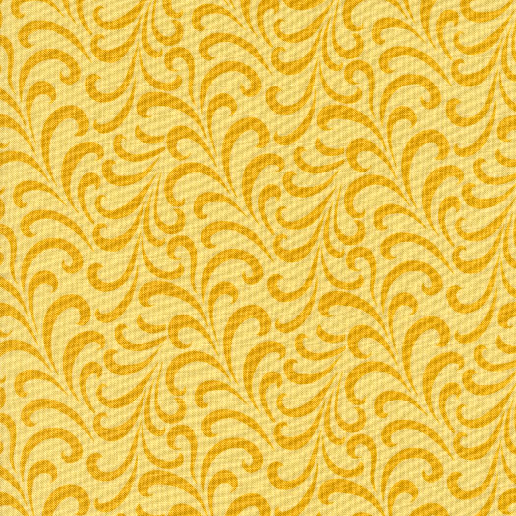 a yellow background with swirls and leaves