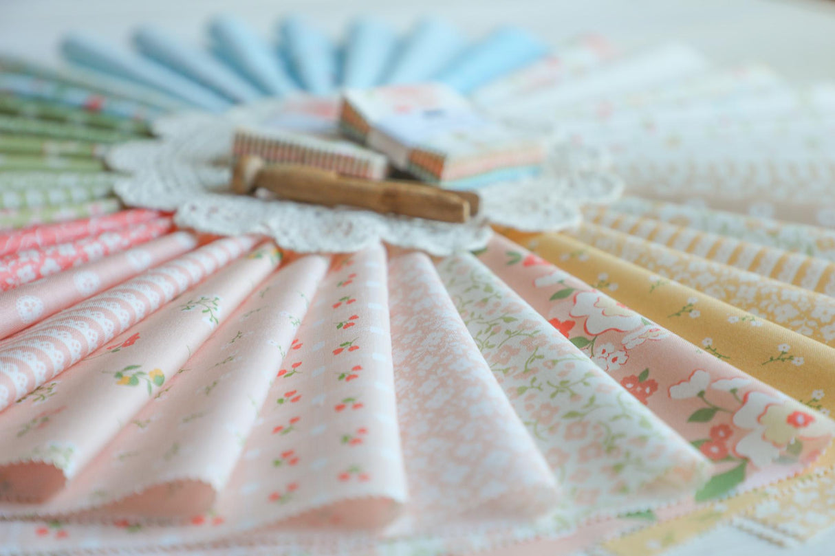 a close up of many different colored papers