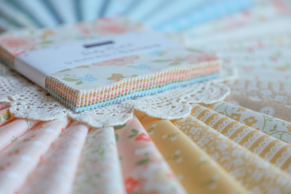 a close up of many different colored papers