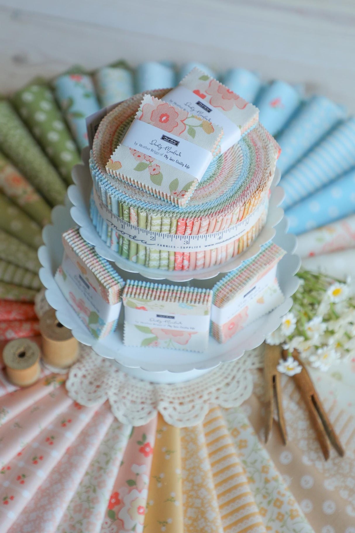 a stack of folded paper sitting on top of a table