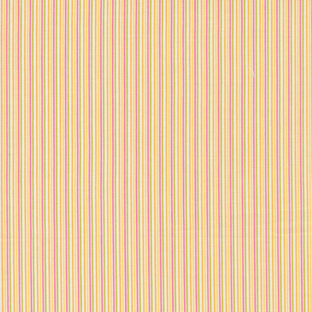 a close up of a yellow and red striped fabric