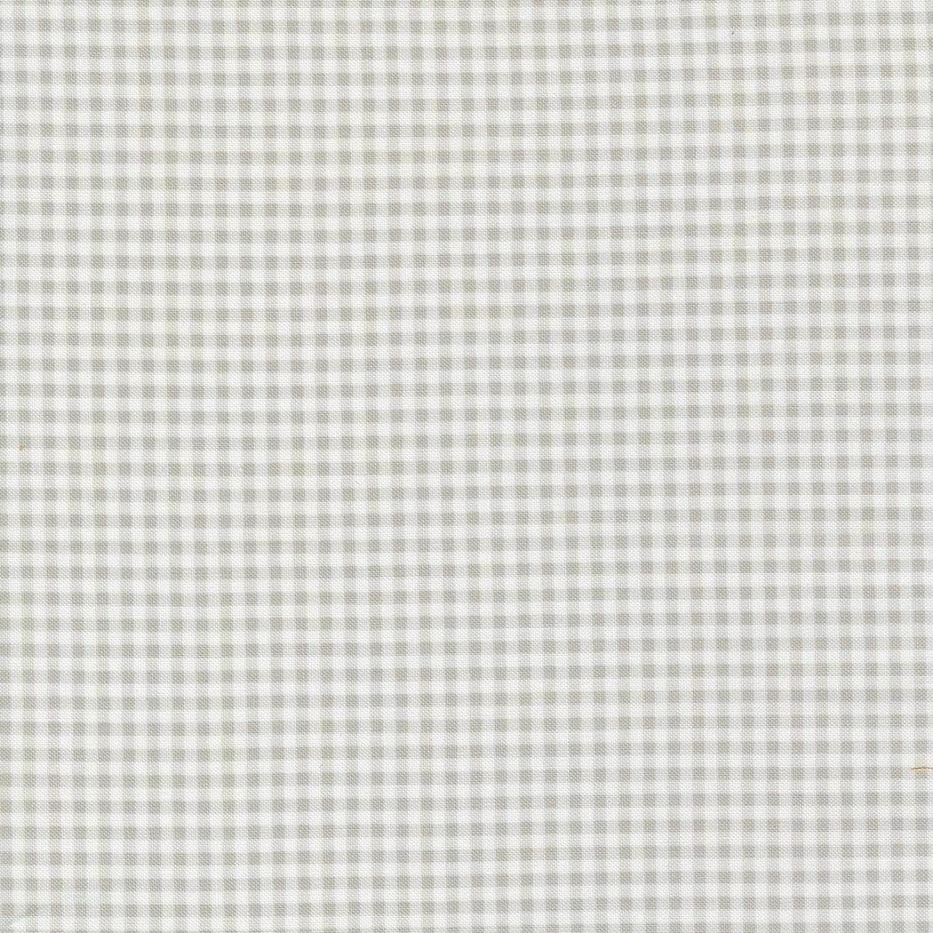 a black and white photo of a man in a suit and tie