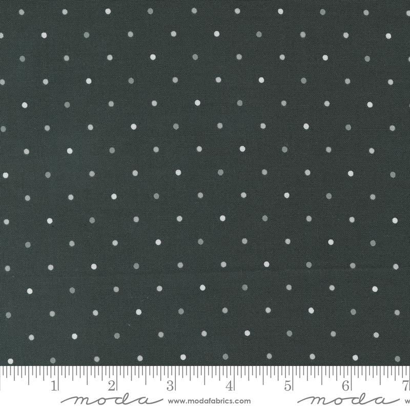 a black background with white polka dots
