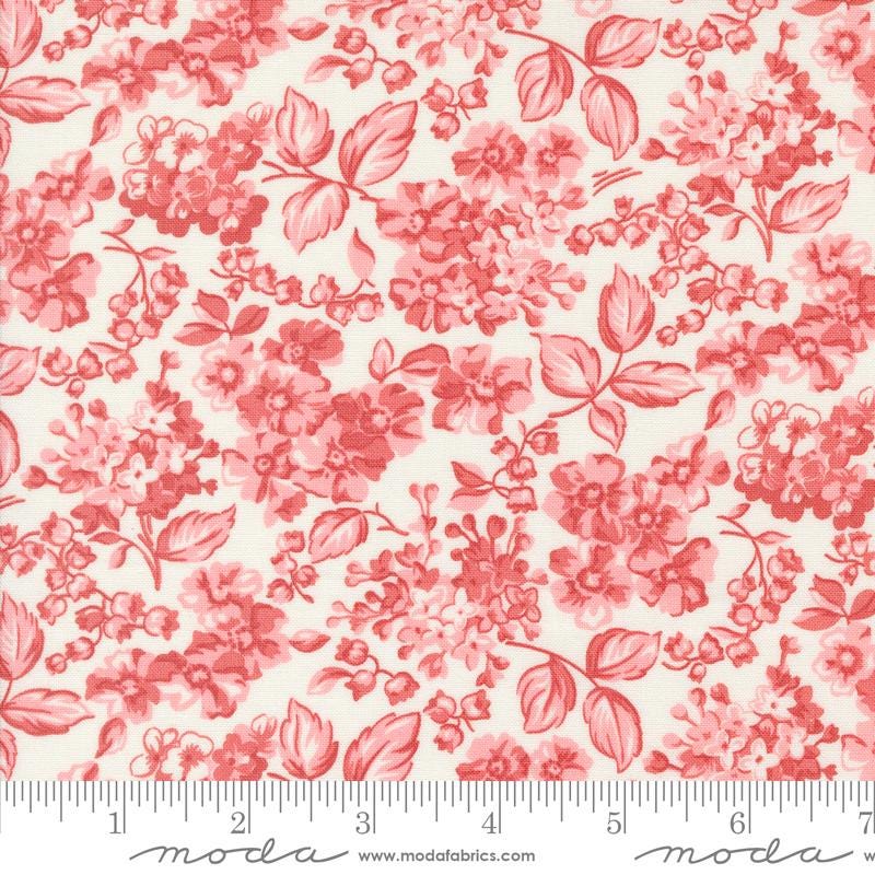 a red and white floral print on a white background