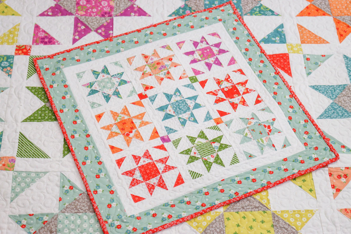a close up of a quilt on a table