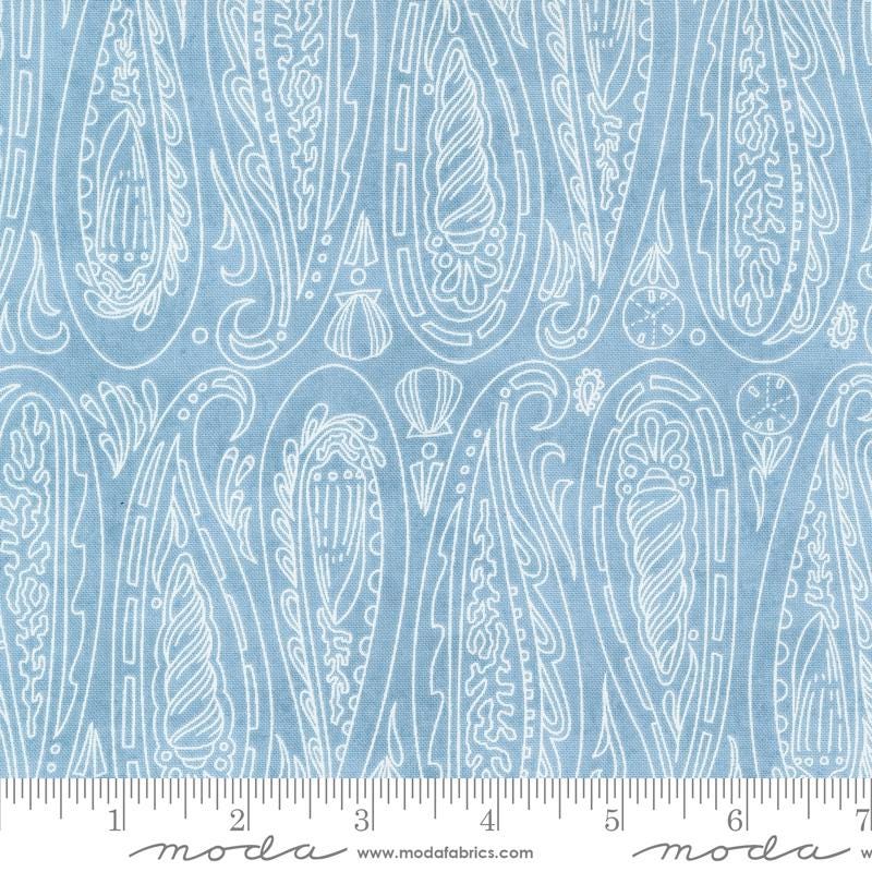 a ruler with a blue and white pattern on it