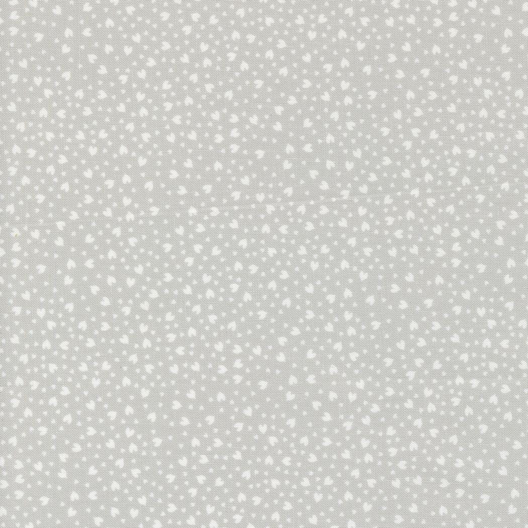 a white background with small white dots