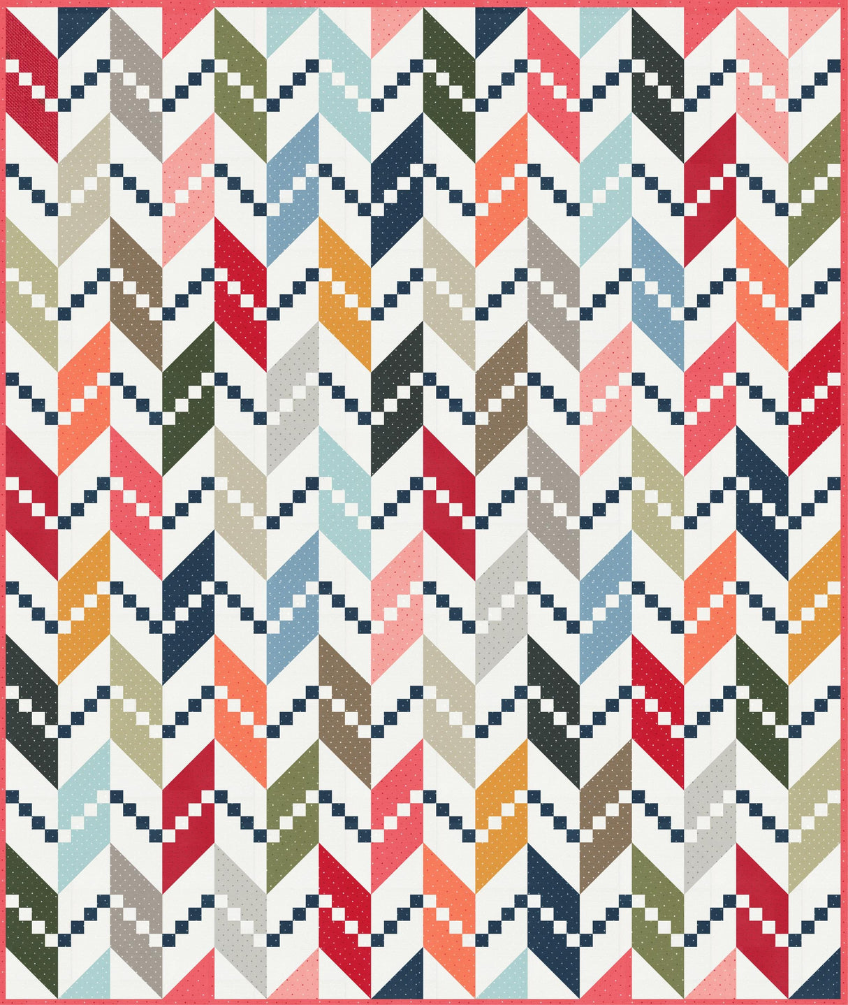 a multicolored quilt with a red border