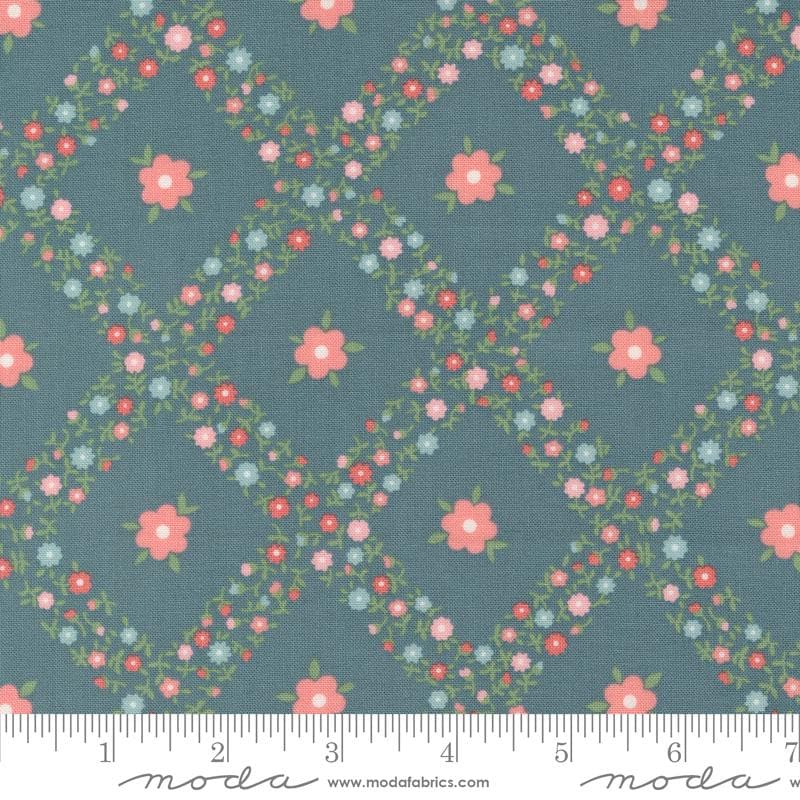 a blue background with pink and blue flowers