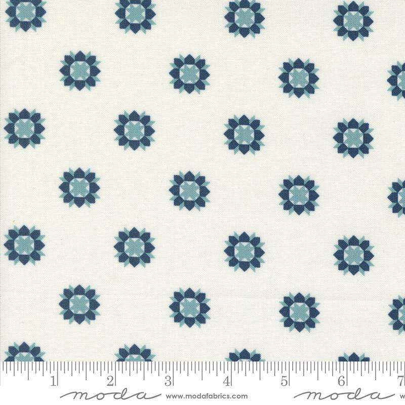 a blue and white flower pattern on a white background