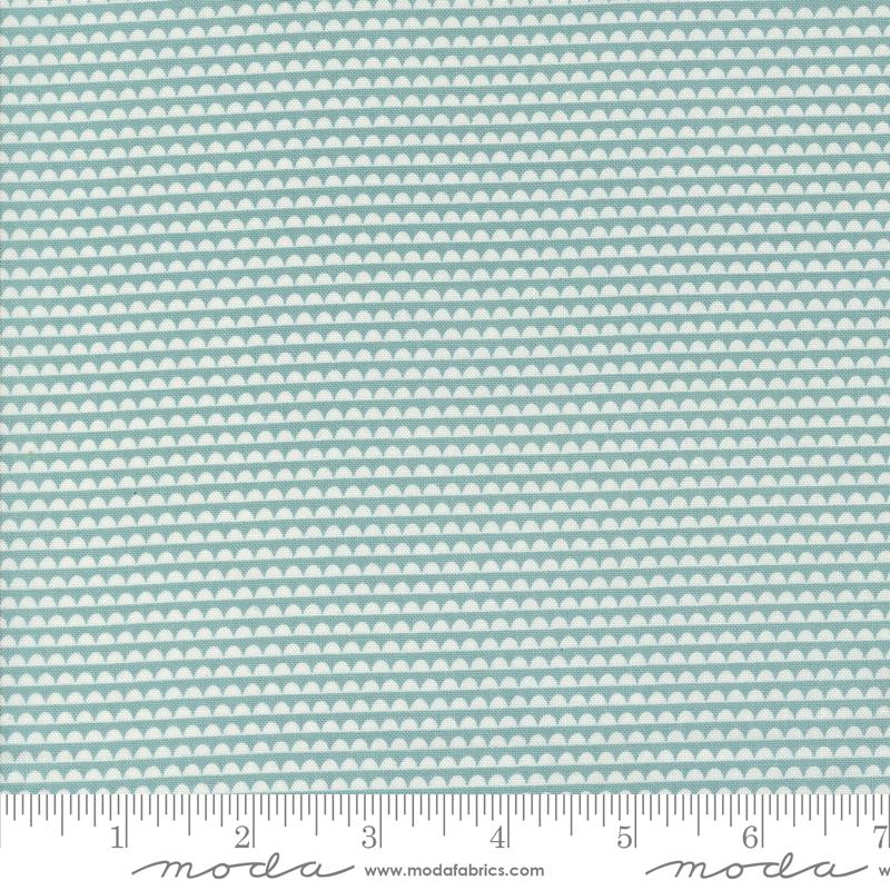 a ruler with a blue and white pattern on it