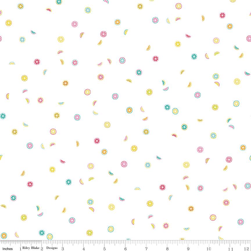 a white background with colorful sprinkles and flowers