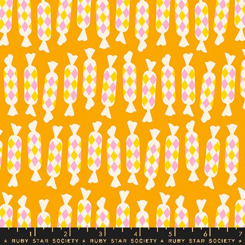 a yellow background with pink and yellow geometric shapes
