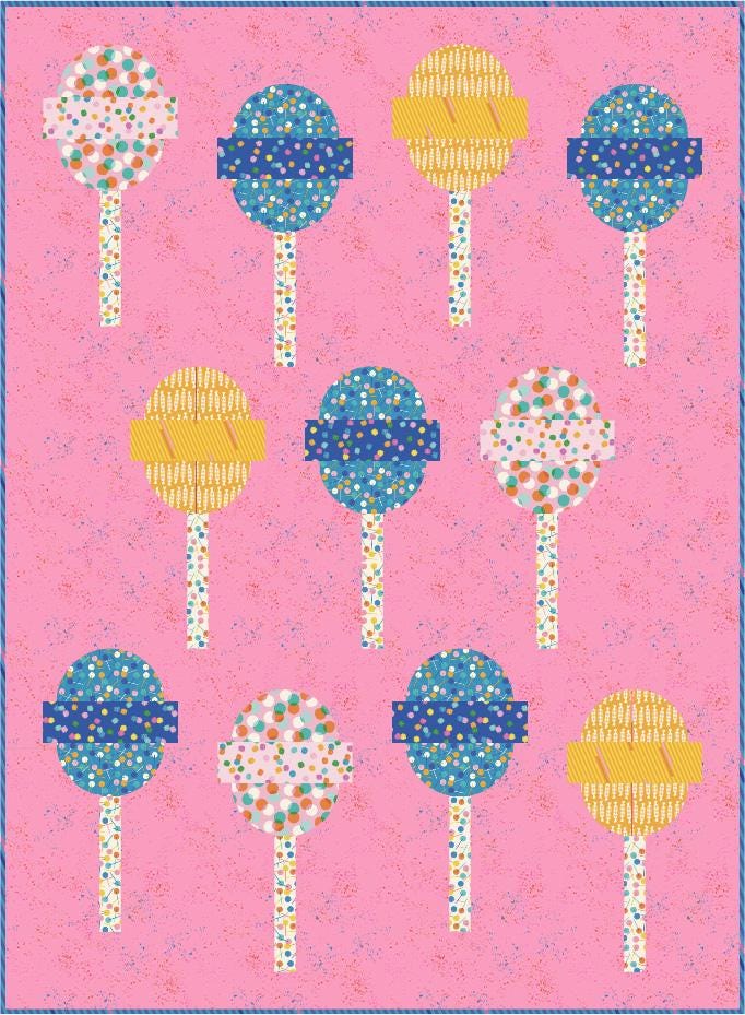 a pink background with a bunch of lollipops on it
