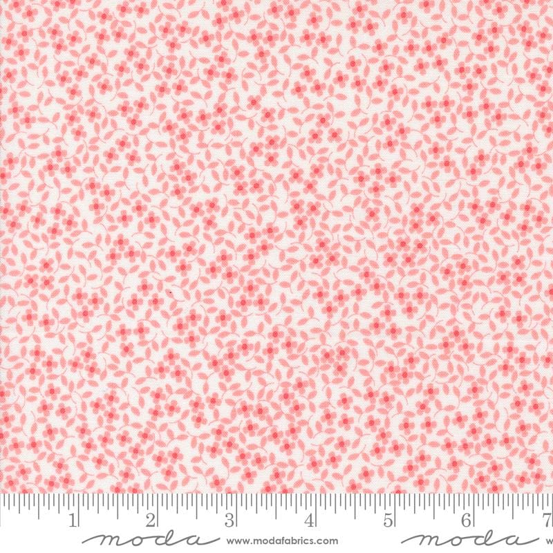 a ruler with a red flower pattern on it