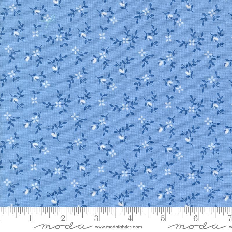 a blue fabric with white flowers on it