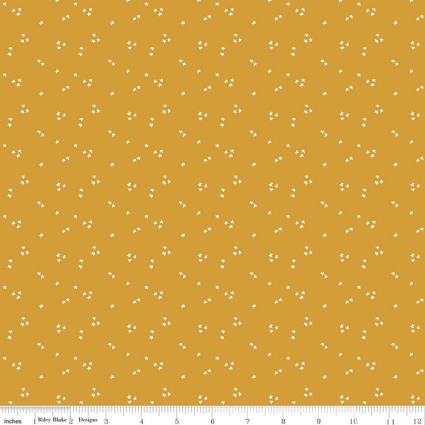 a yellow background with small white dots