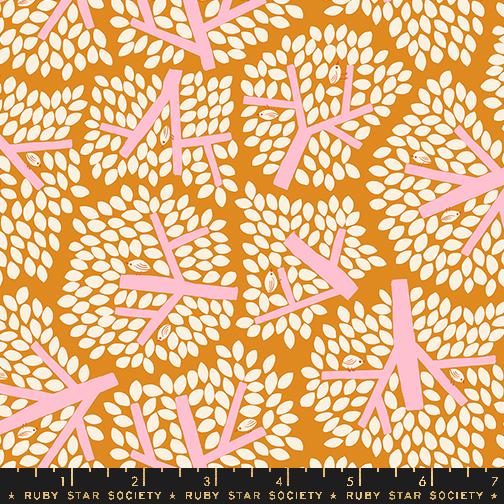 an orange and white pattern with white leaves