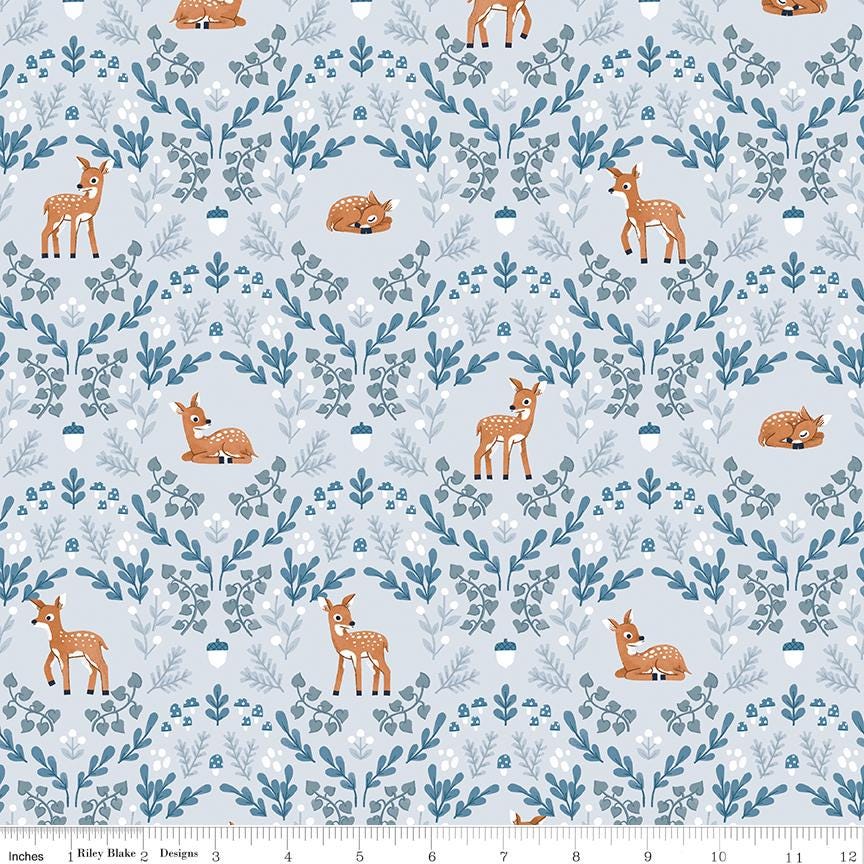 a picture of a deer and a deer in the woods