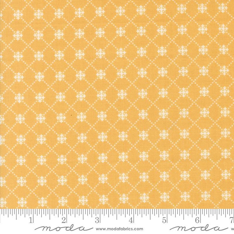 a ruler with a yellow background and white dots