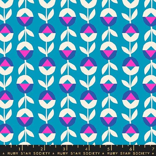 a blue background with pink and white leaves