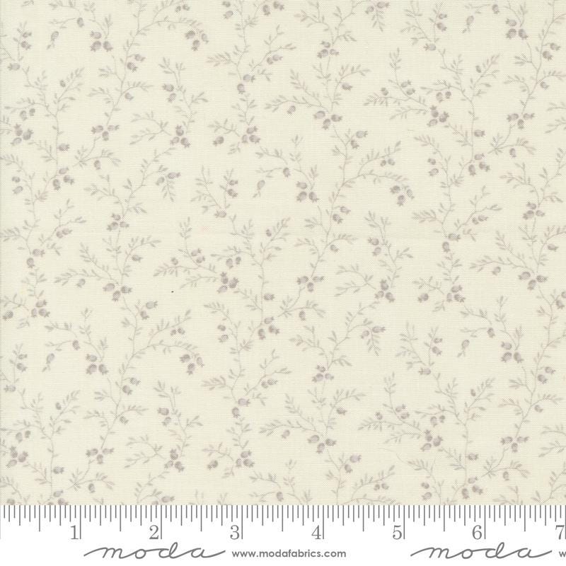 a white fabric with small flowers on it
