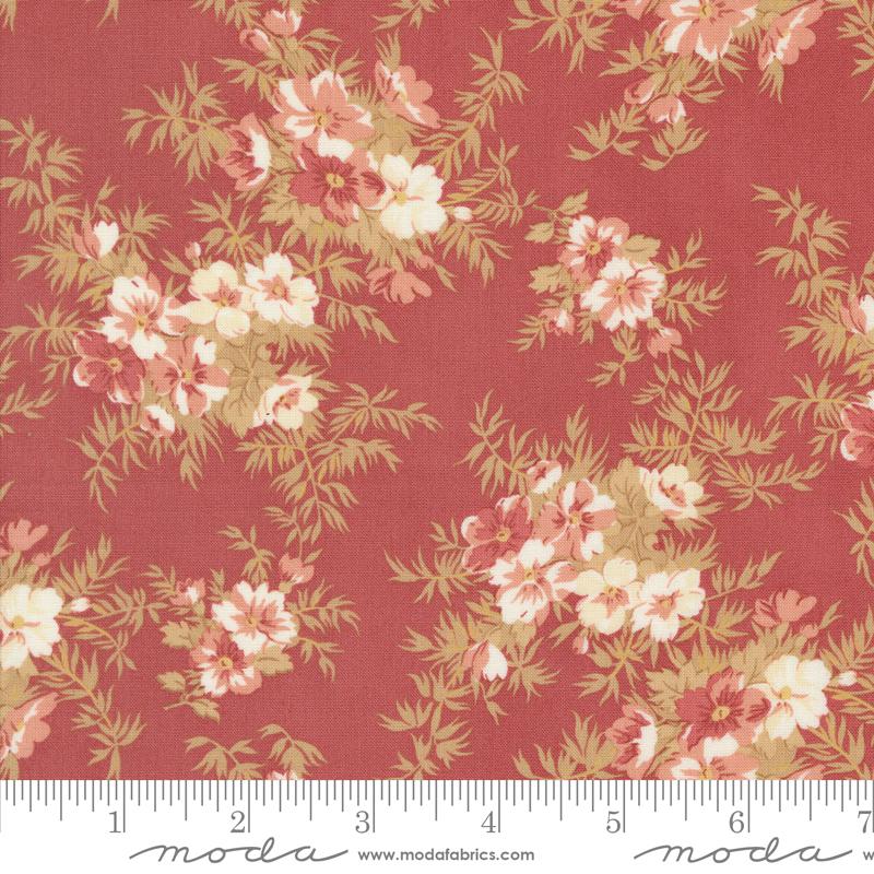 a red flowered fabric with white and pink flowers