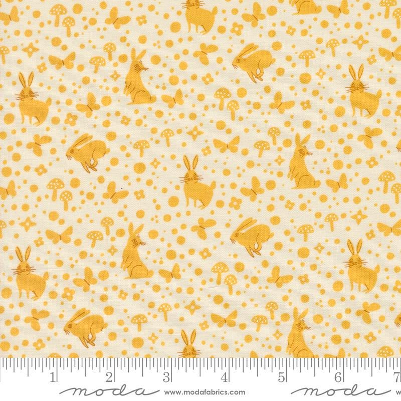 a yellow and white background with rabbits and mushrooms