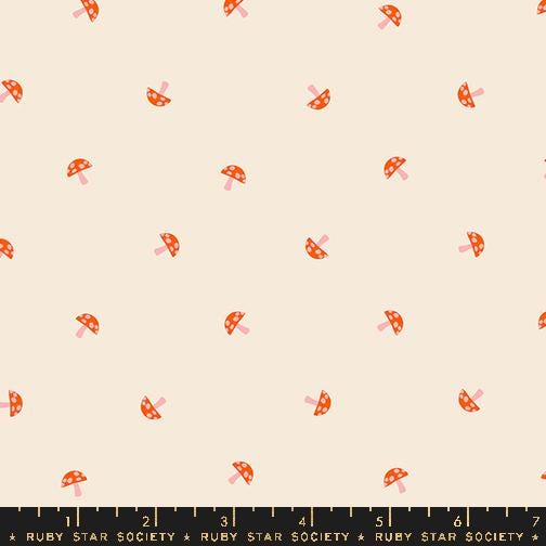 a ruler with a pattern of small red objects on it