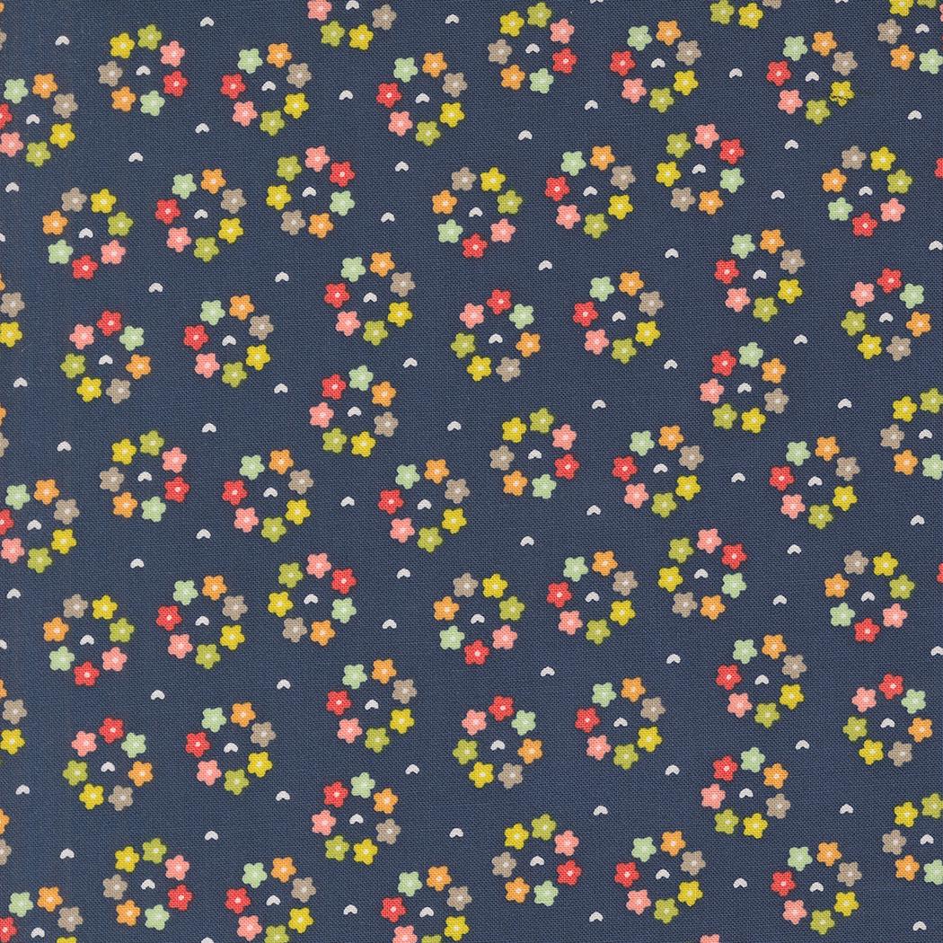 a blue background with multicolored flowers on it
